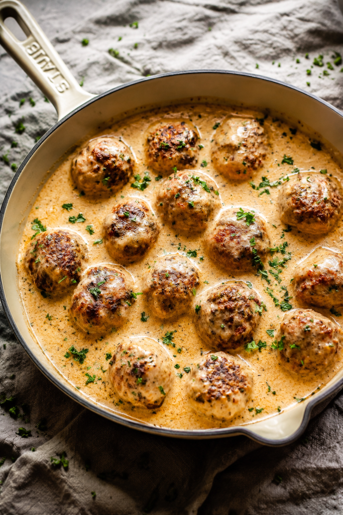 Chicken meatball mixture formed into evenly sized balls