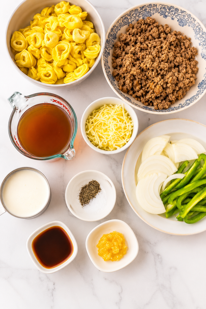 Ground beef, peppers, and onions in a slow cooker