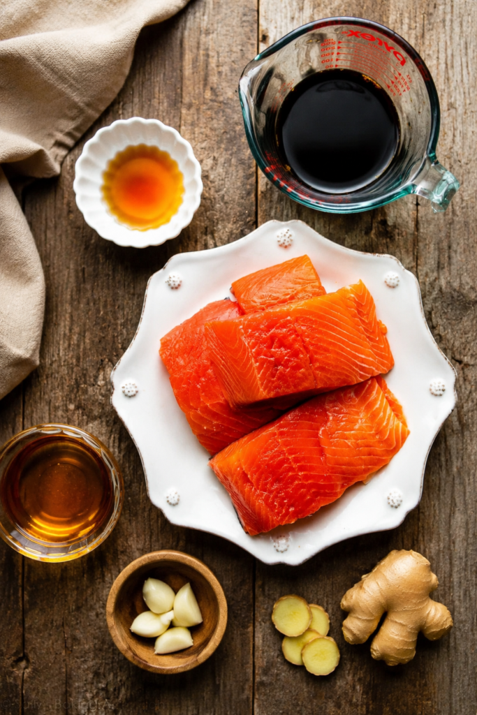 Salmon fillets searing golden in a skillet