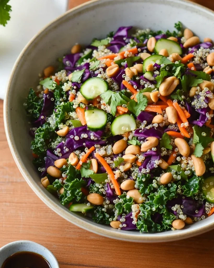 Peanut lime dressing poured over chopped Thai salad