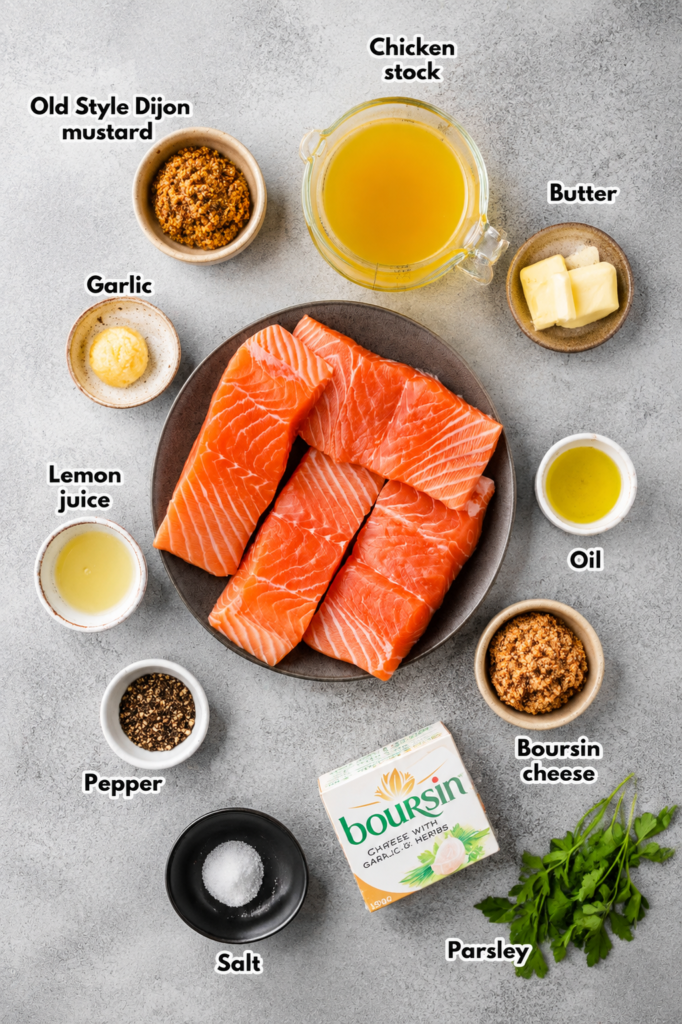 Salmon fillets patted dry on a baking sheet