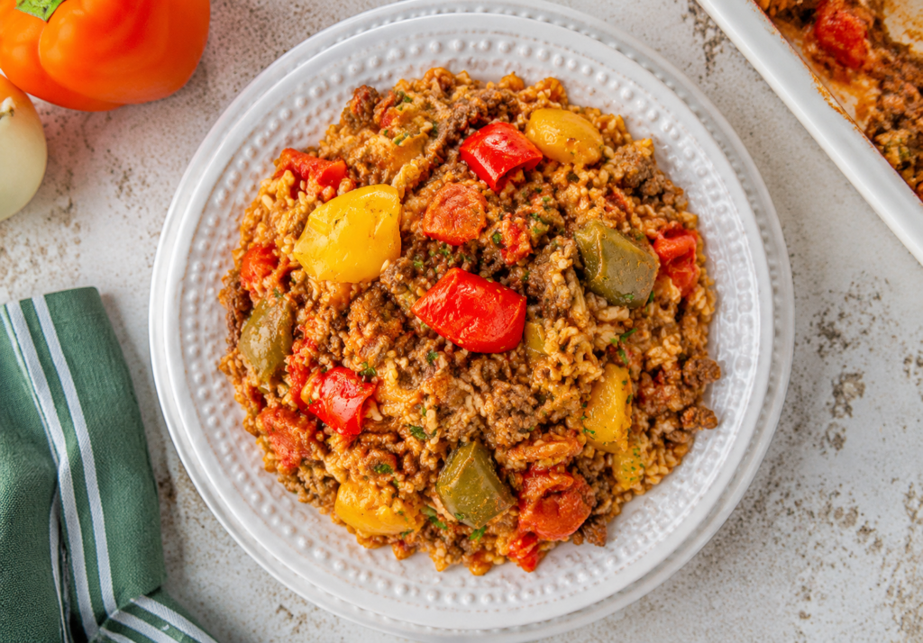 Baked stuffed bell pepper casserole with melted cheese